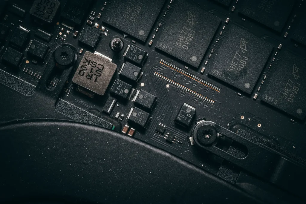 Close-up of chips on a dark circuit board